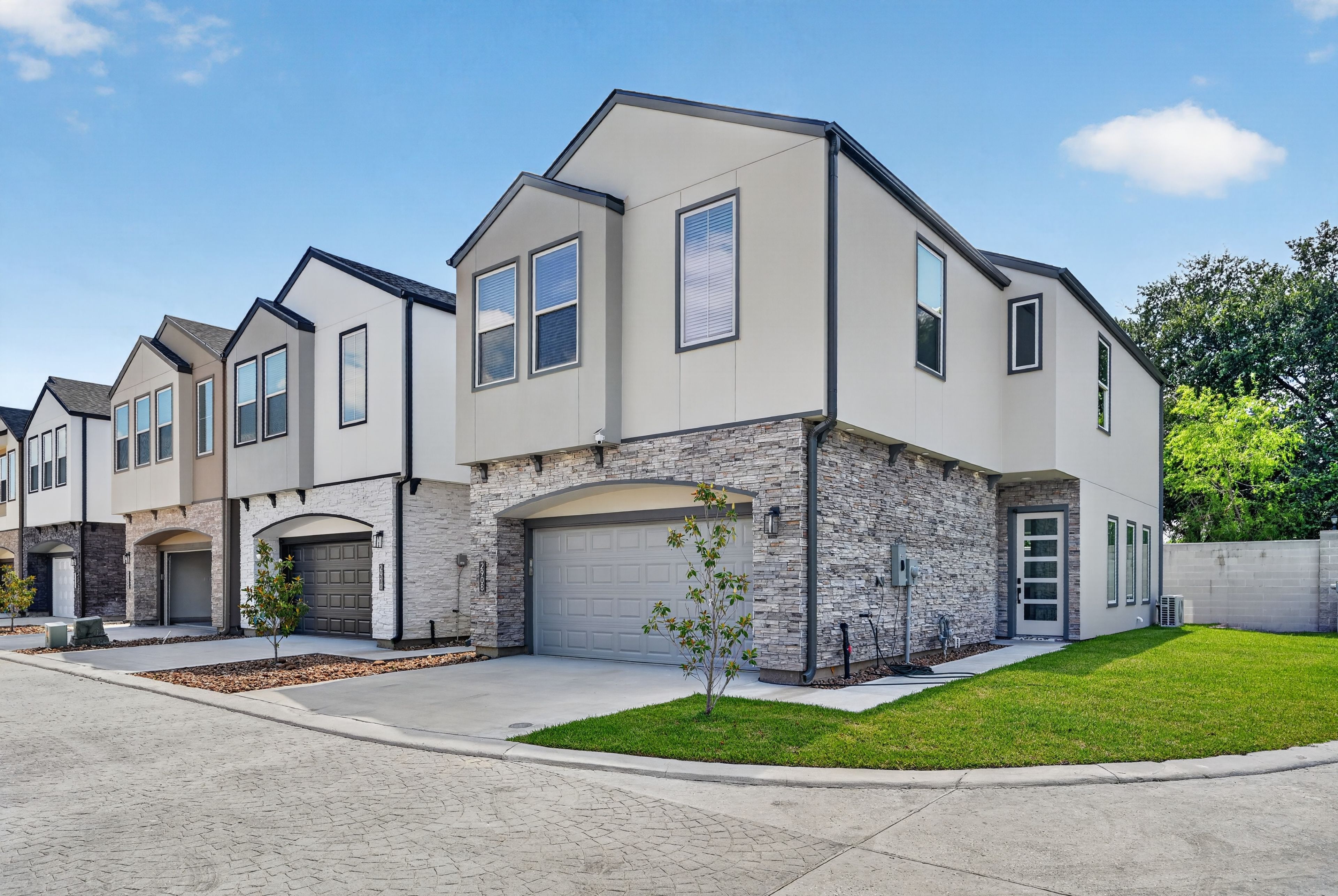 Exterior | Garage (2 Small Vehicles) | Driveway (2 Vehicles) | EV Charger