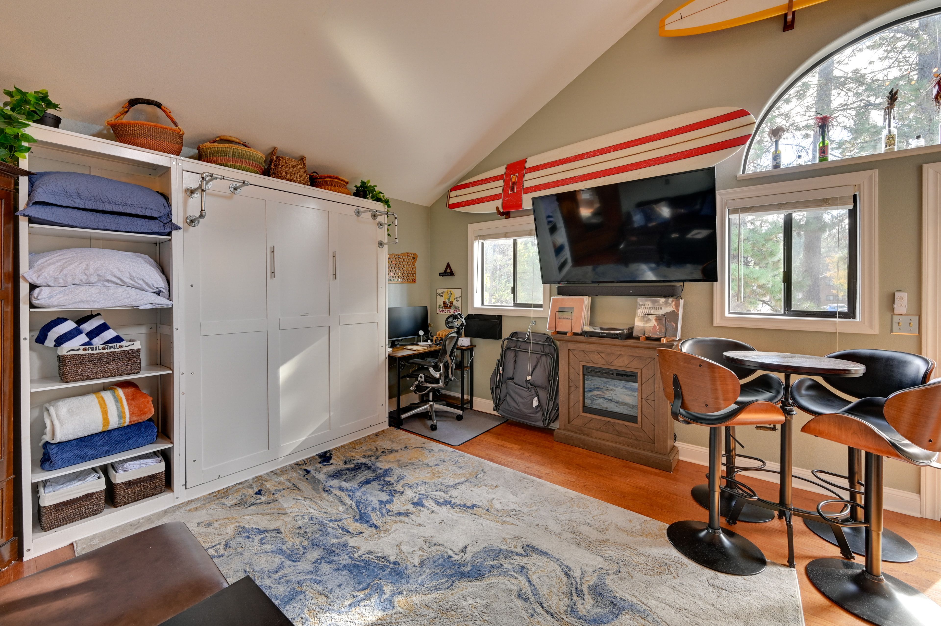 Studio | Living & Sleeping Area | Queen Murphy Bed