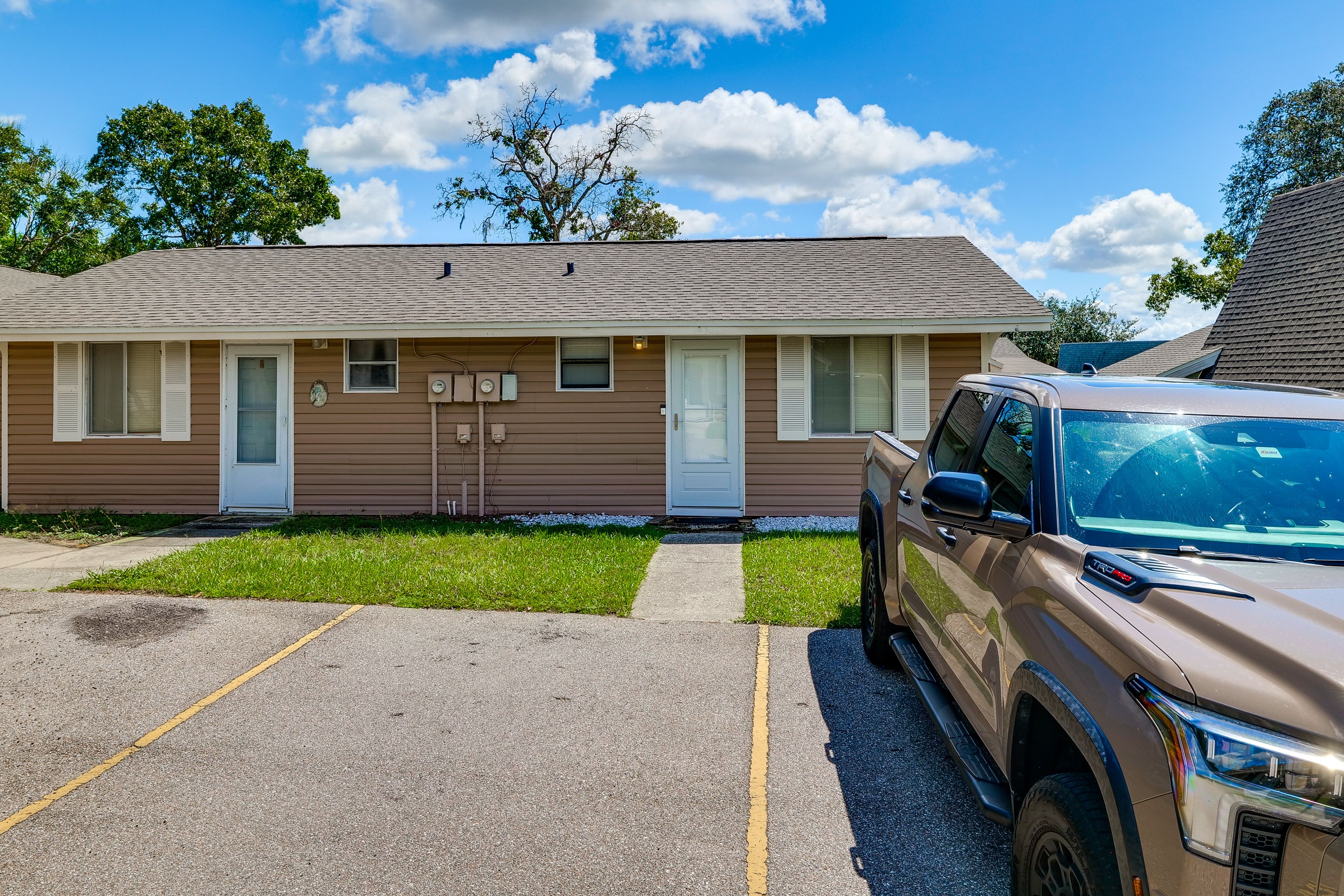Parking | Designated Spot (1 Vehicle) | Community Lot (First-Come, First-Served)