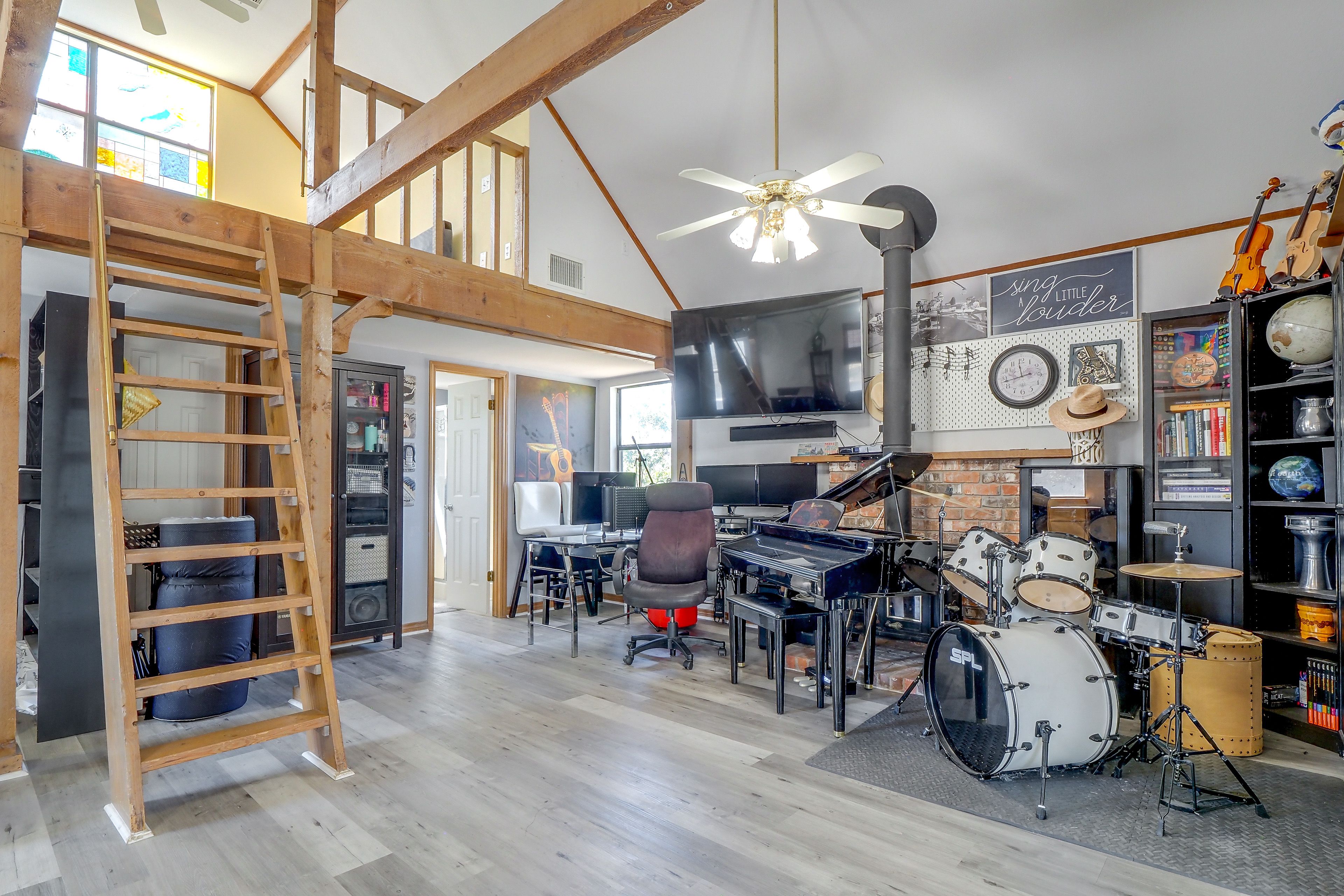 Living Area | Workspaces | Piano | Drum Set